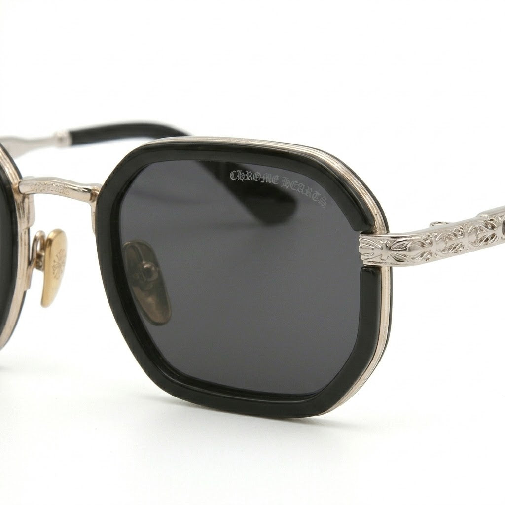 Close-up of intricate 7A quality gothic floral engravings on silver frames