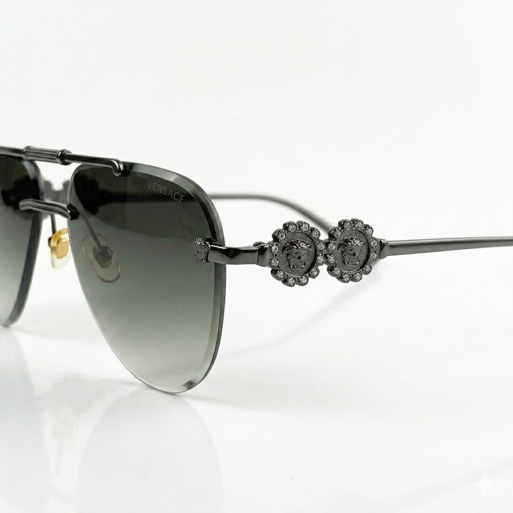Close-up of 7A quality gold-tone hardware on green Versace 3096 frames.