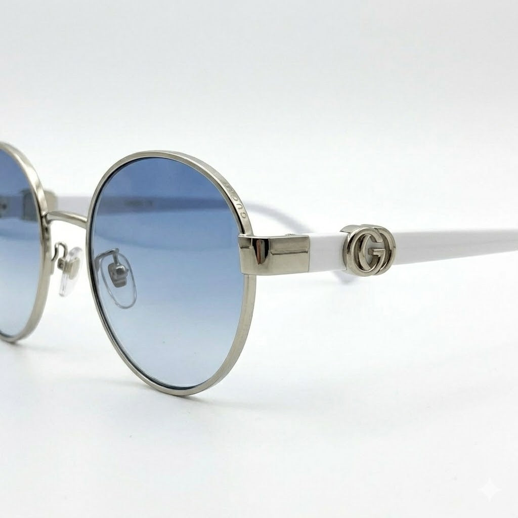 Close-up of 7A quality ocean blue tinted lenses on Gucci 019